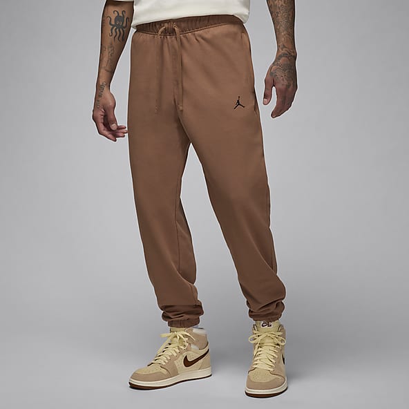 Burgundy nike tracksuit bottoms top